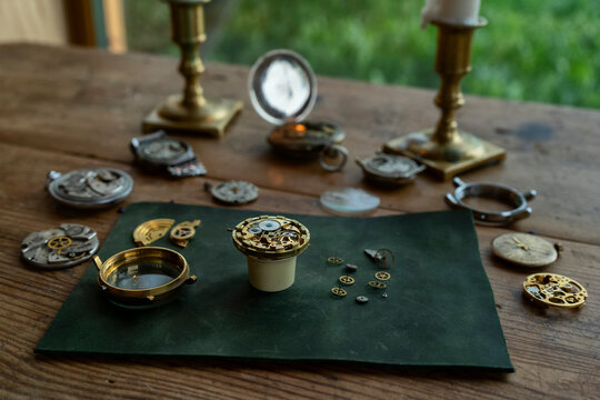 Traditional watchmaker workshop with vintage mechanical watches and tools