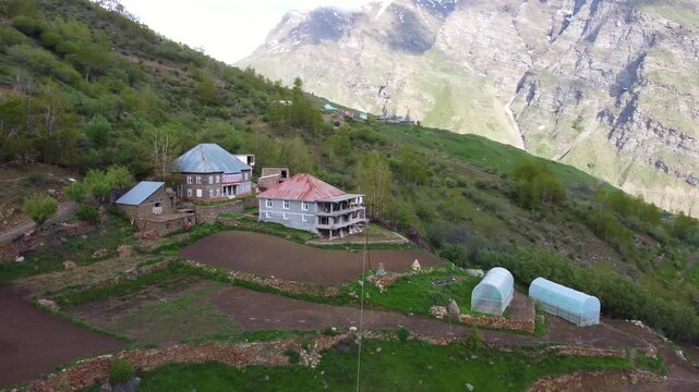 Remote House in the Himalayas Overlooking Mountain Valley, India