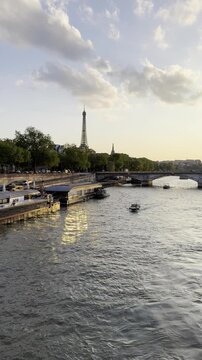 Eiffel Tower and Seine River at sunset in Paris, France