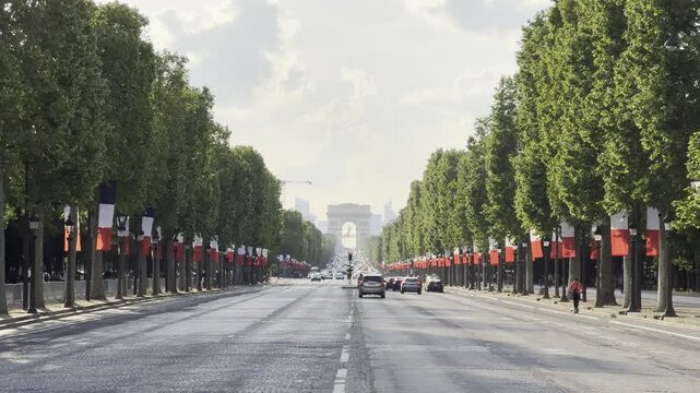 Champs-&Eacute;lys&eacute;es avenue with traffic in Paris, France during spring
