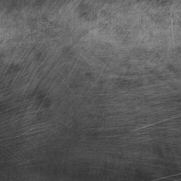 Dark scratched metal texture background with a rugged style