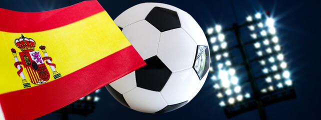 flag of Spain and crowd cheering in stadium © Melinda Nagy