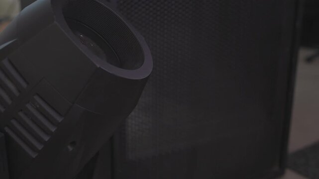 Yellow stage light illuminating indoor scene