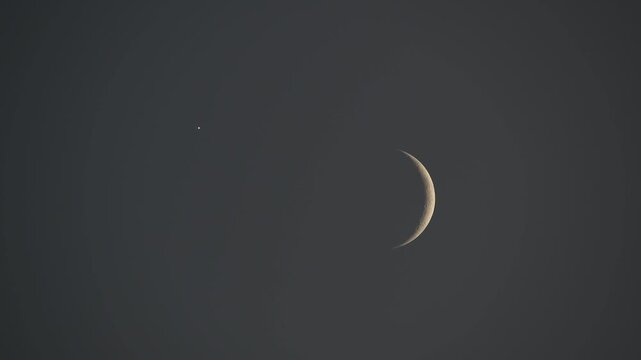 Astronomical event featuring beautiful crescent moon and Venus