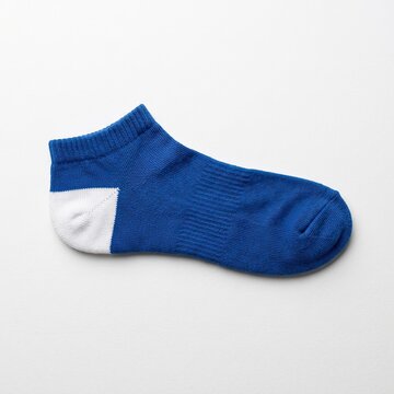 Blue and white ankle sock on white background Isolated on white background for cutting out.