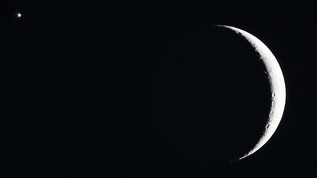 Beautiful celestial alignment with planet Venus and crescent moon