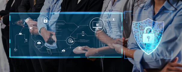 A group of professionals in formal attire stands together, showcasing a digital interface that highlights essential elements of cybersecurity, privacy, and data protection concepts. Trope © InfiniteFlow
