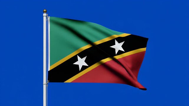 Saint Kitts and Nevis flag waving proudly against a blue screen background&nbsp;symbolizing national pride and Caribbean identity in motion