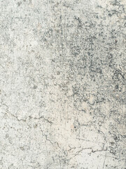 Obraz premium A textured light grey surface featuring distressed patterns with dark scratches and weathering effects perfect for artistic industrial style backgrounds