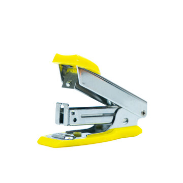 Open yellow and silver metal office stapler isolated on a white background