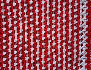Fototapeta premium handmade crochet cloth mesh pattern texture background fabric crochet mesh cloth white red textile detail close up pattern background white red fashion cloth mesh holes crochet dots lace wallpaper