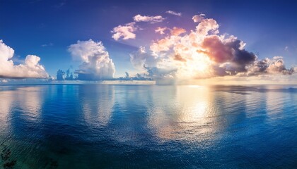 Obraz premium breathtaking ocean view reflection sky clouds colorful dream background sun rays seascape panoramic nature scenery summer travel horizon tropical paradise serene tranquil spectacular vista wallpaper