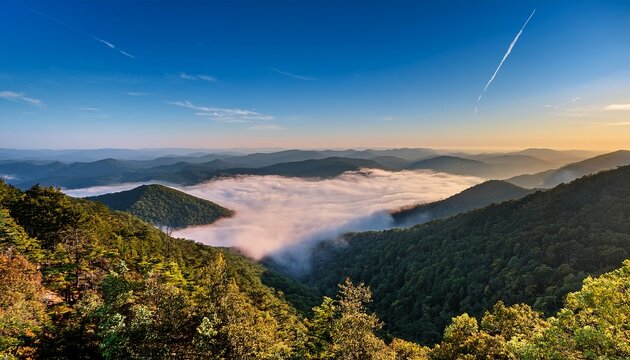 view of fog and mountains from the appalachian trail atop cole mountain in amherst county virginia