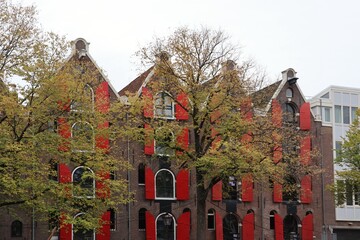 Naklejka premium old houses in bruges belgium