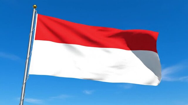 National flag of Indonesia waving against a clear blue sky