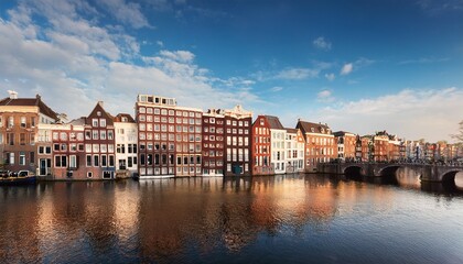 Naklejka premium old buildings in amsterdam