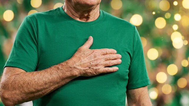 Man Pointing to Chest in Casual Stance with Warm Bokeh Lights, Confidence and Reassurance Concept for Wellness, Customer Care, Coaching