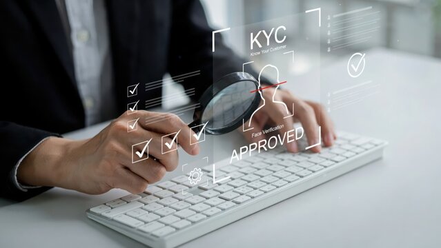 Business person typing on a computer keyboard with digital kyc approved interface