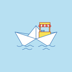 Fototapeta premium A small paper boat carries a tiny yellow food stall kiosk