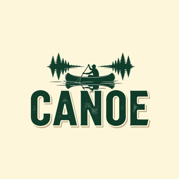 Vintage canoe logo with a paddler on a lake surrounded by pine trees.