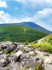 Naklejka premium 小浅間山の岩場から望む雄大な浅間山