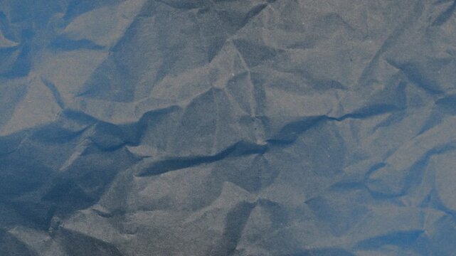Abstract Crinkled Paper Motion Graphic Background 4K