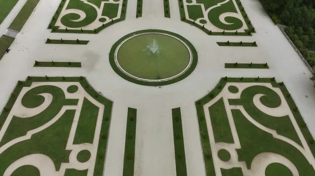 Formal parterre gardens with central fountain at Domaine Departemental de Sceaux