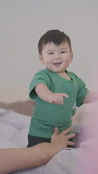 Cute Asian Toddler Looking at Camera Indoors, Adorable Child Portrait and Family Lifestyle in 4K