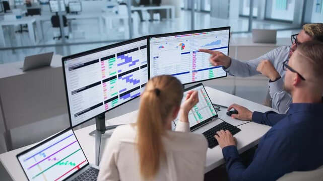 Medical Billing Analyst Coding Spreadsheets On Laptop
