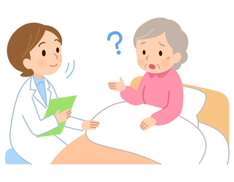 ベッドに座る高齢女性の話を聞く医者　訪問看護