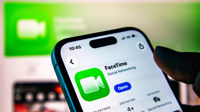 Closeup of a smartphone screen displaying the apple facetime app page in the app store