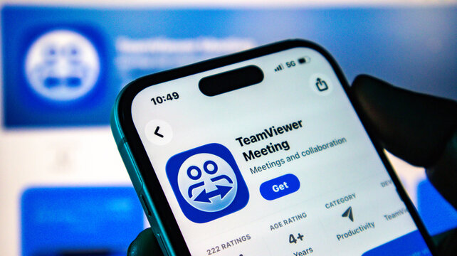 Closeup of a smartphone screen displaying the teamviewer meeting app page on the apple app store