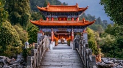 Obraz premium Serene Arched Stone Bridge Leading to Majestic Temple Gate in Nature