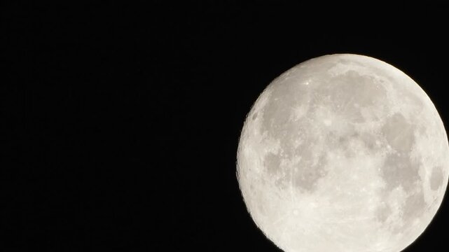 Moon astronomy lunar detailed view of the full moon in the dark night sky for scientific or atmospheric use