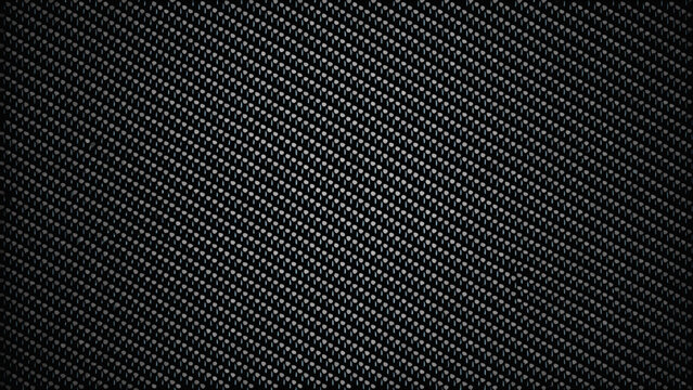 Carbon fiber weave pattern with a dark background showcasing a repeating diagonal texture