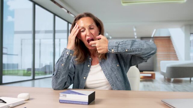 Woman At Home Looking Worried