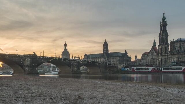 Dresden Germany time lapse sunrise city skyline at Elbe River and Augustus Bridge