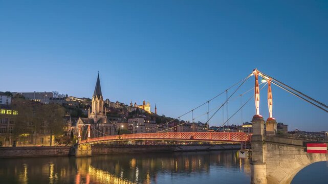 Lyon France time lapse night city skyline at Red footbridge Passerelle St Georges (Le Tronc de Lyon)