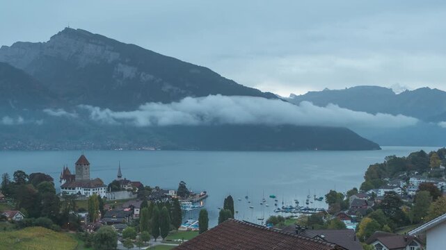 Spiez Switzerland time lapse night to day city skyline at Lake Thun