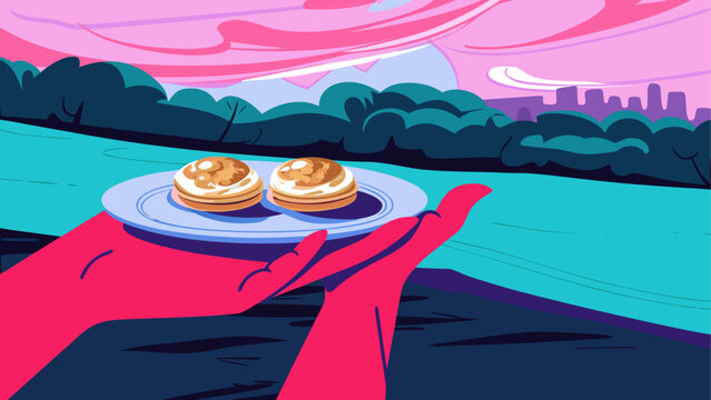 Hand holding plate with donuts in city park