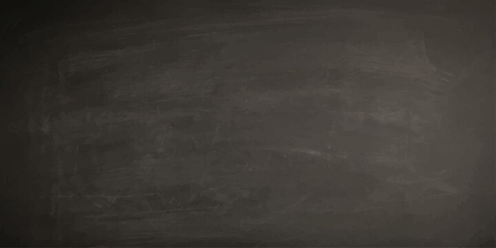 A blank blackboard surface, lightly dusted with chalk, waits patiently for new lessons, ideas, or creative expressions.