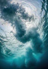 Fototapeta premium Underwater View of a Powerful Breaking Ocean Wave with Sunlight and Bubbles in Turquoise Blue Sea