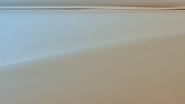 Abstract minimalist wave motion on soft blue and beige background
