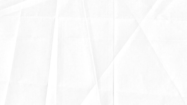 Video effect.Animated stop motion of wrinkled white paper unfolding on a black background.Video 4k resolution.