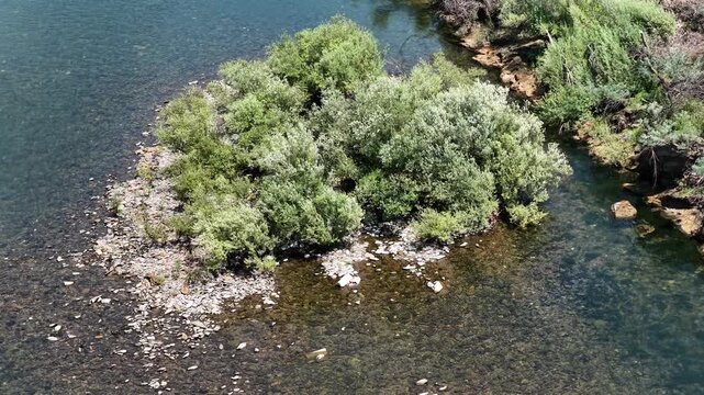 Drone over Castelo do Bode Dam in Portugal with river and calm waters.
4K high quality cinematic nature footage.