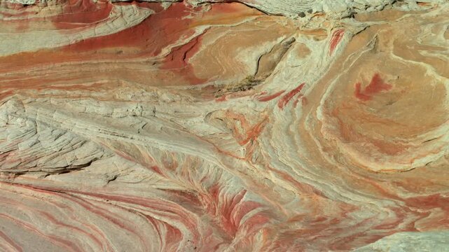 White Pocket Arizona red and white swirling sandstone rock formation texture background