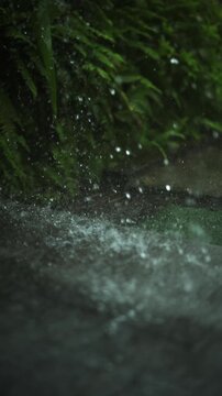 Heavy rain dropping continuous flood risk storm extreme weather climate change disaster