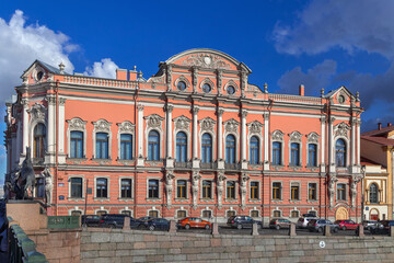 Fototapeta premium Facade of Beloselsky-Belozersky Palace by Fontanka River in Saint Petersburg, Russia. View from the water on a sunny day