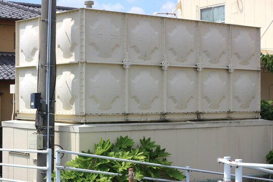 Large FRP Water Storage Tank Installed in a Residential Area