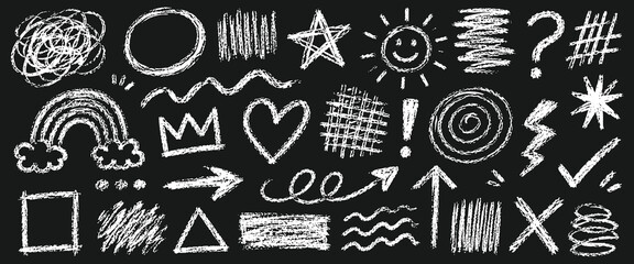 Set of handdrawn chalk doodles on a black background © Zbrake Studio